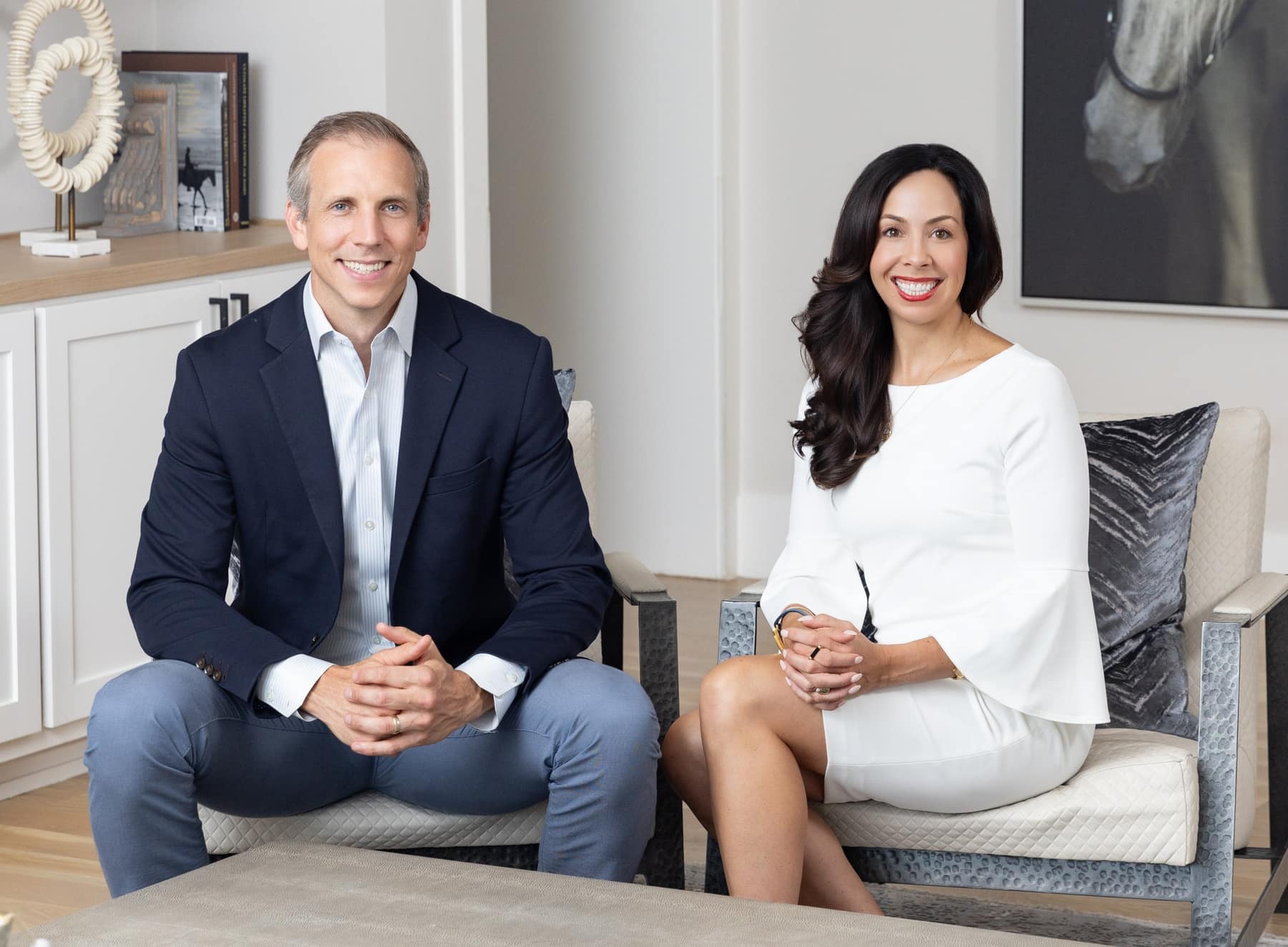 Mike Fromhold and Brittany Tipton, co-founders of Everest Collective, seated together