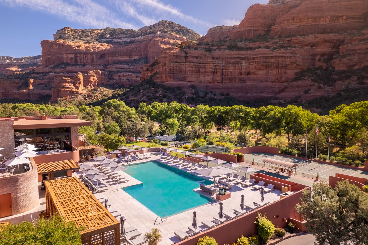 Aerial view of the resort pool and terrace with Boynton Canyon cliffs behind